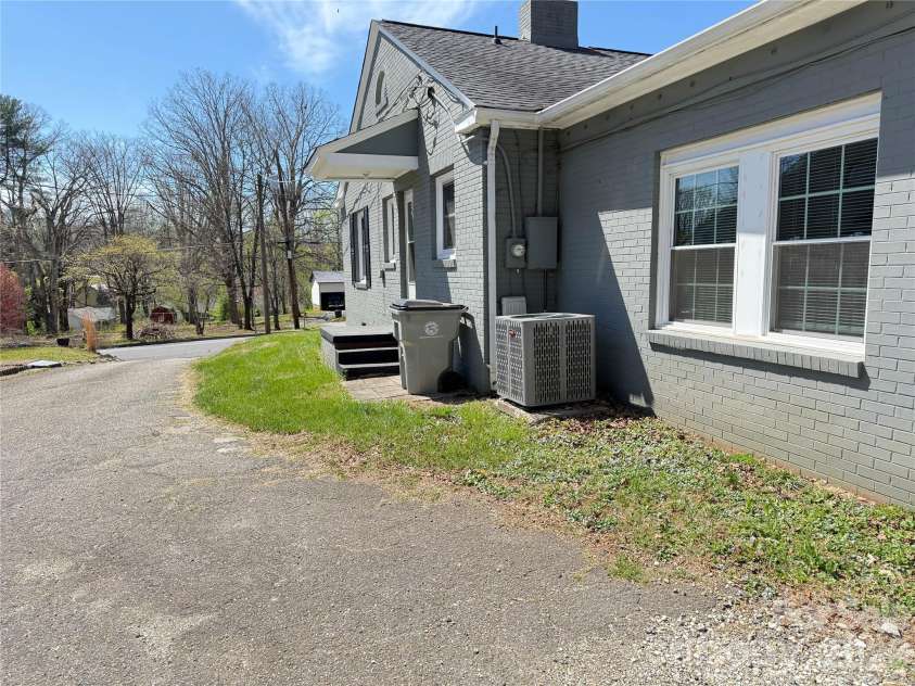316 Sharon Avenue, Lenoir, NC 28645.  MLS# CAR4361436, YatesRealty ID 7202. Side View/Driveway
