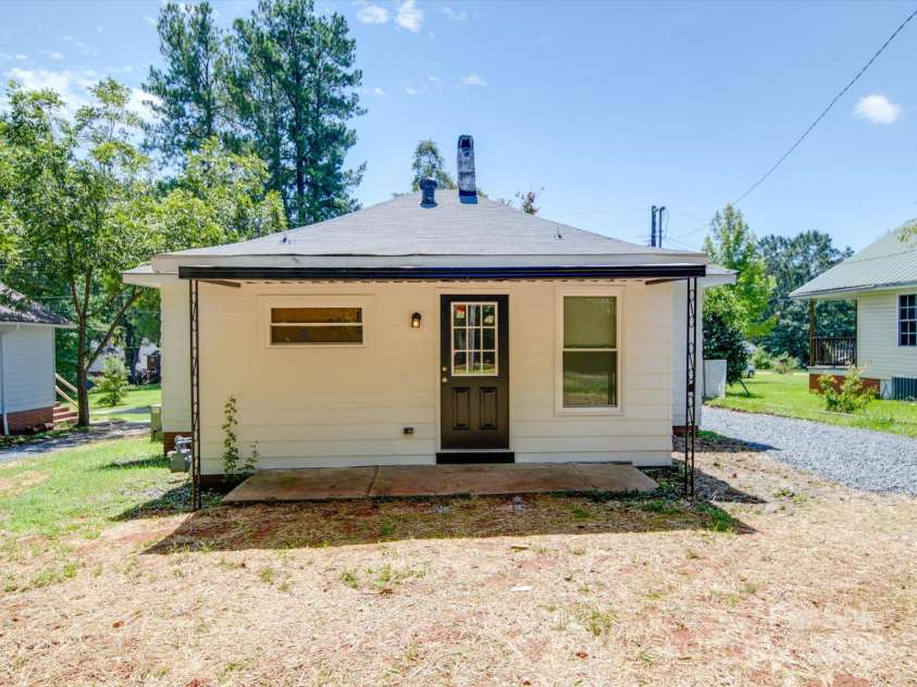 450 Cherry Street, Wadesboro, NC 28170.  MLS# CAR4174298, YatesRealty ID 7208. Covered Back porch