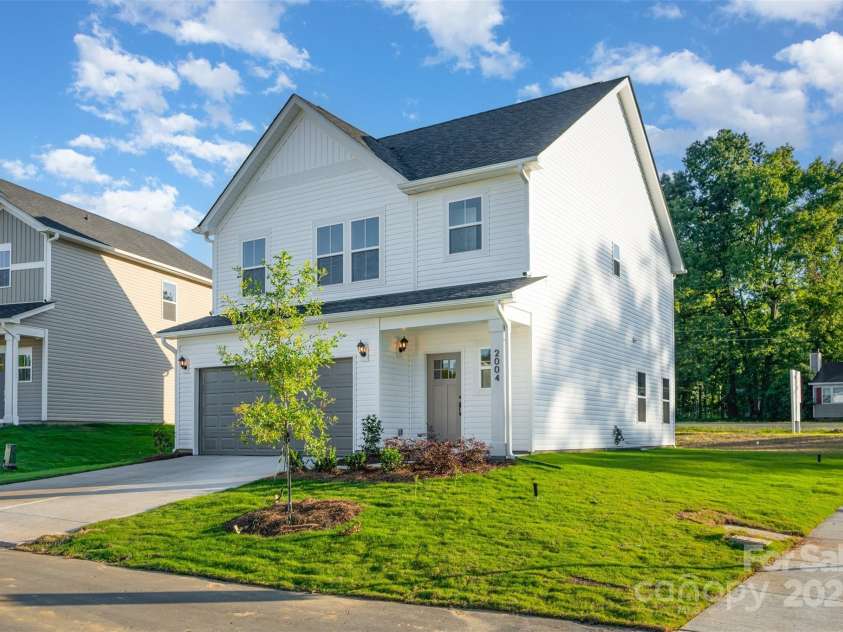 2039 Sadler Woods Lane, Charlotte, NC 28214.  MLS# CAR4265579, YatesRealty ID 721. Double-car garage. Representational Photo.