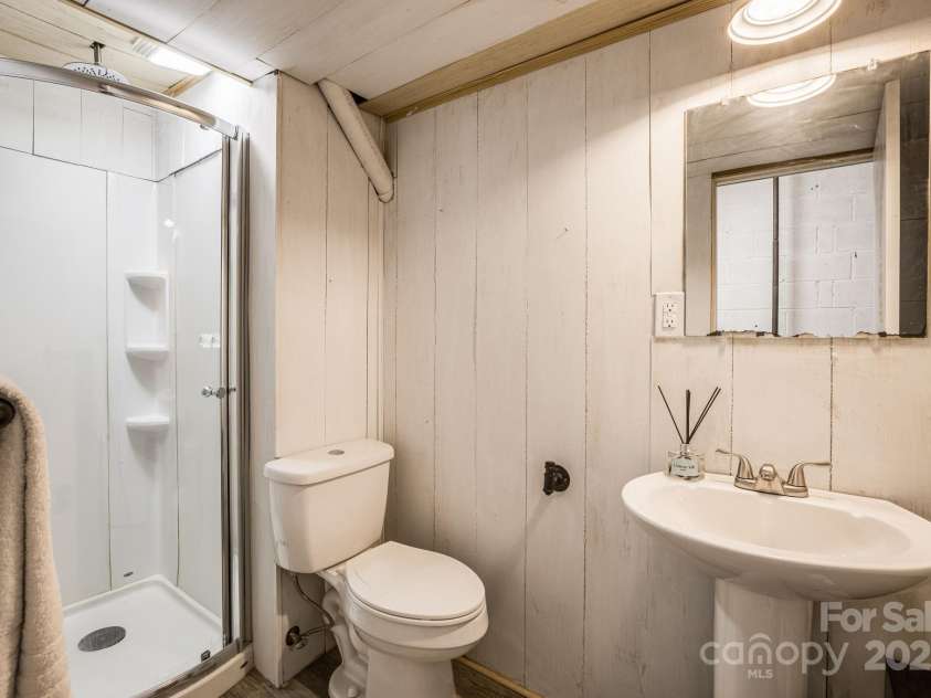 85 Woody Farm Road, Hot Springs, NC 28743.  MLS# CAR4248089, YatesRealty ID 7213. Basement bathroom