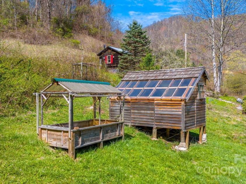 85 Woody Farm Road, Hot Springs, NC 28743.  MLS# CAR4248089, YatesRealty ID 7213. Greenhouse/potting shed