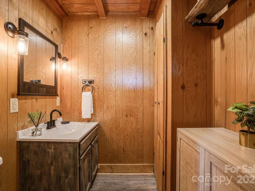 85 Woody Farm Road, Hot Springs, NC 28743.  MLS# CAR4248089, YatesRealty ID 7213. Main half bath