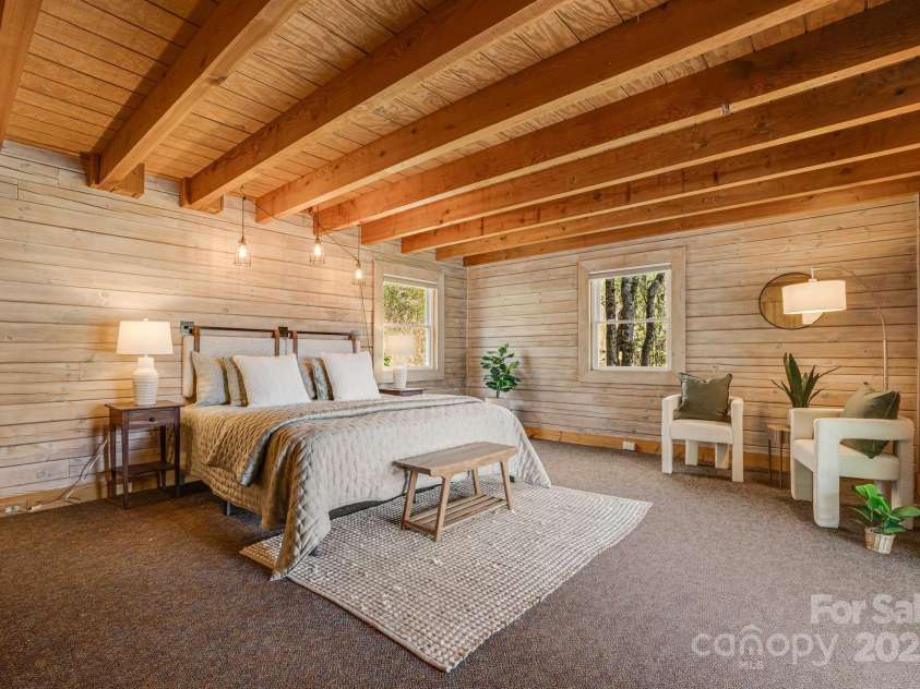 85 Woody Farm Road, Hot Springs, NC 28743.  MLS# CAR4248089, YatesRealty ID 7213. Main level primary bedroom