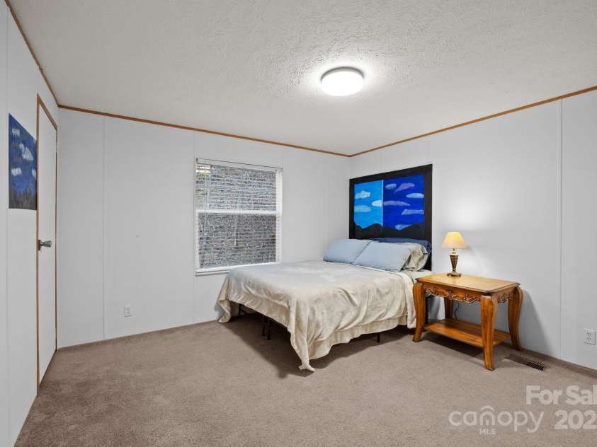 615 School Road, Asheville, NC 28803.  MLS# CAR4243519, YatesRealty ID 7220. 