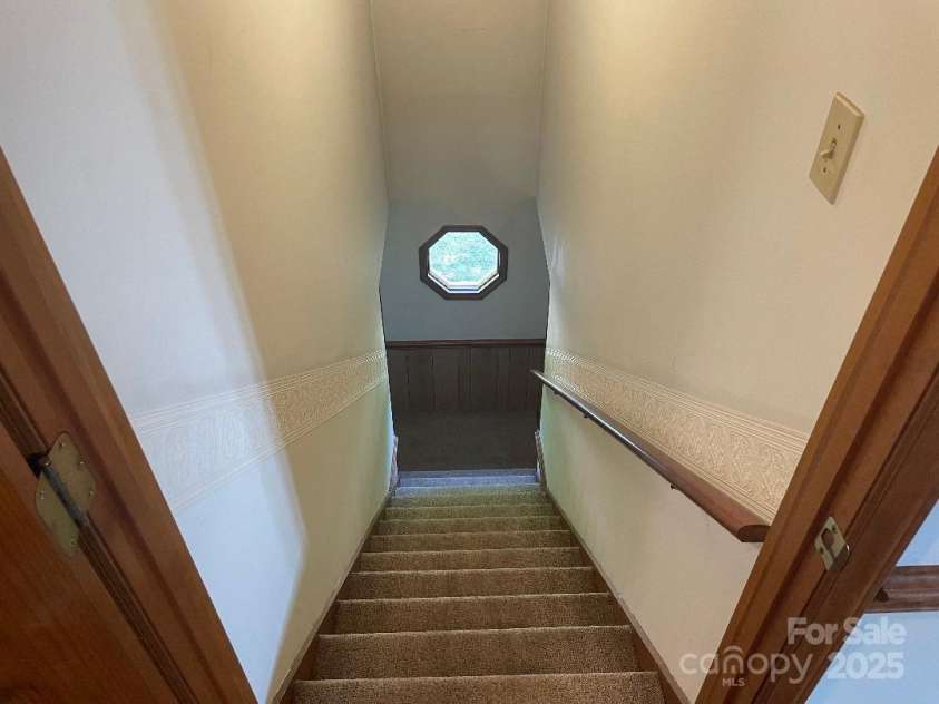 1300 Irish Potato Road, Concord, NC 28025.  MLS# CAR4244013, YatesRealty ID 7225. Inside Stairs looking down