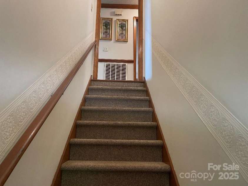 1300 Irish Potato Road, Concord, NC 28025.  MLS# CAR4244013, YatesRealty ID 7225. Inside Stairs looking up