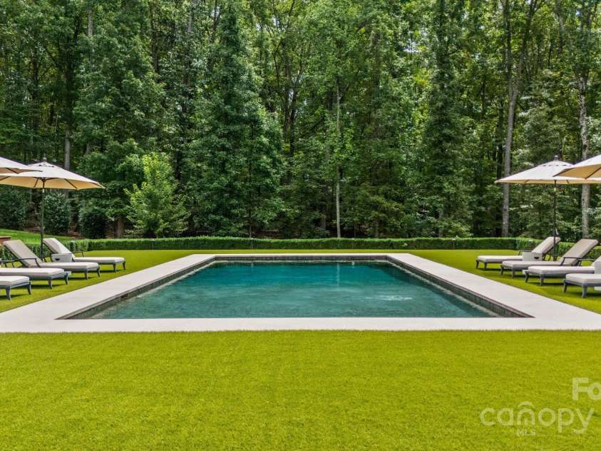 440 Beech Tree Road, Mooresville, NC 28117.  MLS# CAR4293759, YatesRealty ID 7228. Saltwater Pool with Turf Surround