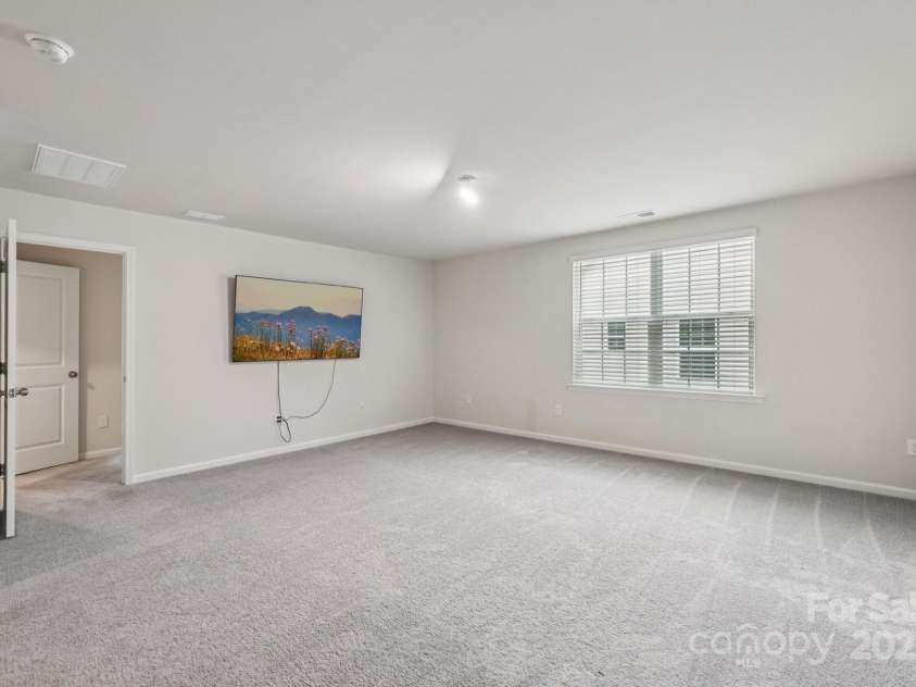 299 Hamptons Cove Road, Troutman, NC 28166.  MLS# CAR4306640, YatesRealty ID 7229. 2nd Floor Loft Area 