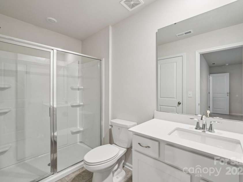 299 Hamptons Cove Road, Troutman, NC 28166.  MLS# CAR4306640, YatesRealty ID 7229. 3rd Floor Bathroom (bathroom 5)