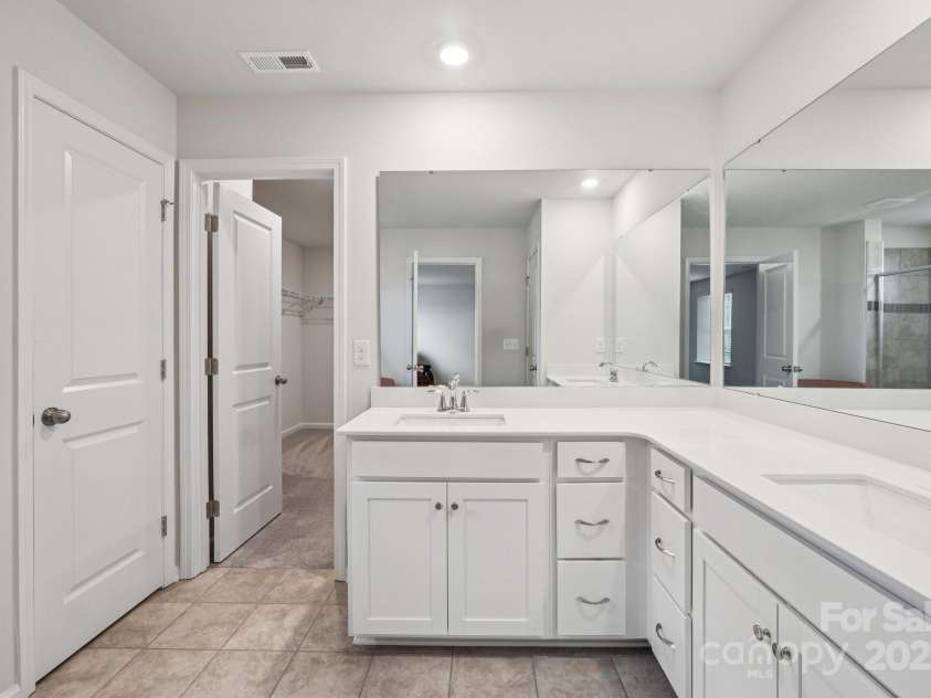 299 Hamptons Cove Road, Troutman, NC 28166.  MLS# CAR4306640, YatesRealty ID 7229. Primary Bathroom 