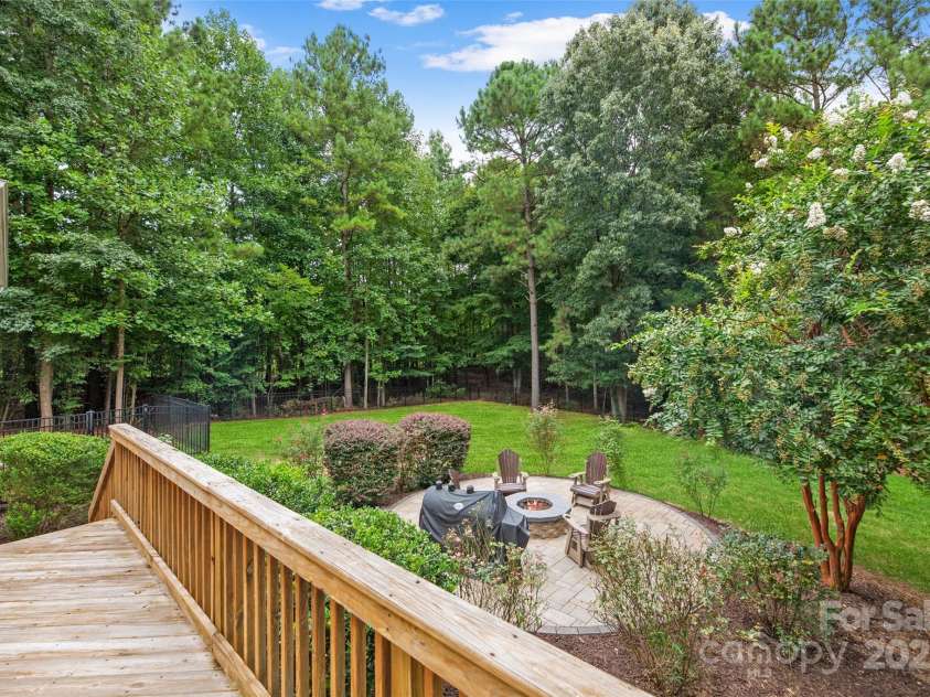 2103 Saddleridge Drive, Waxhaw, NC 28173.  MLS# CAR4305035, YatesRealty ID 723. Back deck w/ private yard & firepit