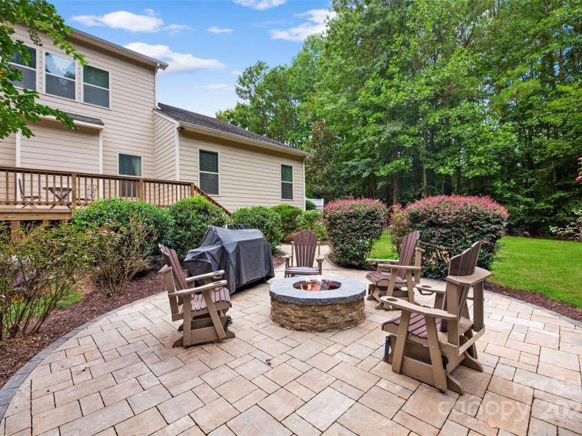 2103 Saddleridge Drive, Waxhaw, NC 28173.  MLS# CAR4305035, YatesRealty ID 723. Back Patio w/ firepit