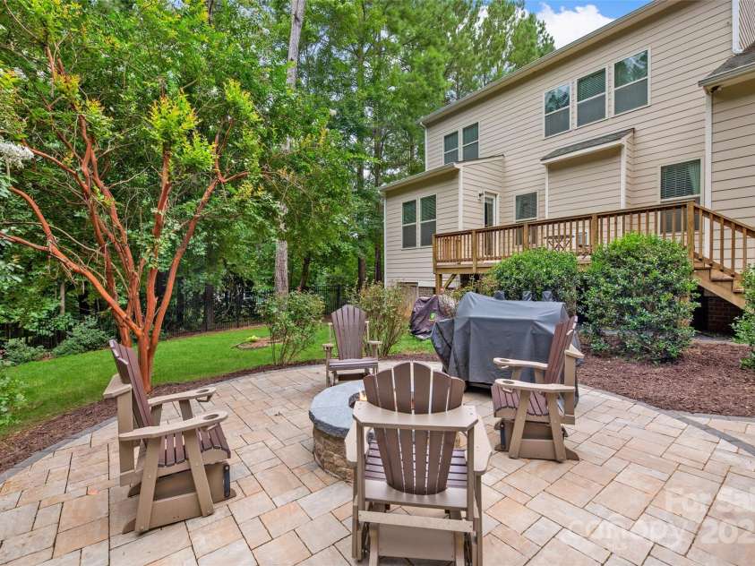 2103 Saddleridge Drive, Waxhaw, NC 28173.  MLS# CAR4305035, YatesRealty ID 723. Backyard Firepit