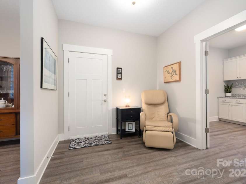 76 Creekside View Drive, Asheville, NC 28804.  MLS# CAR4265172, YatesRealty ID 7234. Reading Nook between Dining Area and Laundry