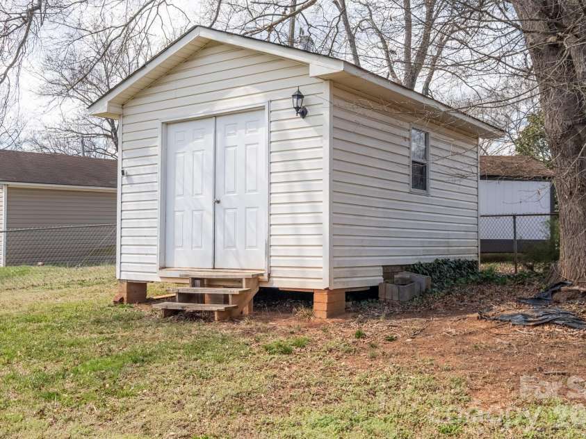 102 Wendover Drive, Lincolnton, NC 28092.  MLS# CAR4352261, YatesRealty ID 7238. Large storage building.  Has electricity.