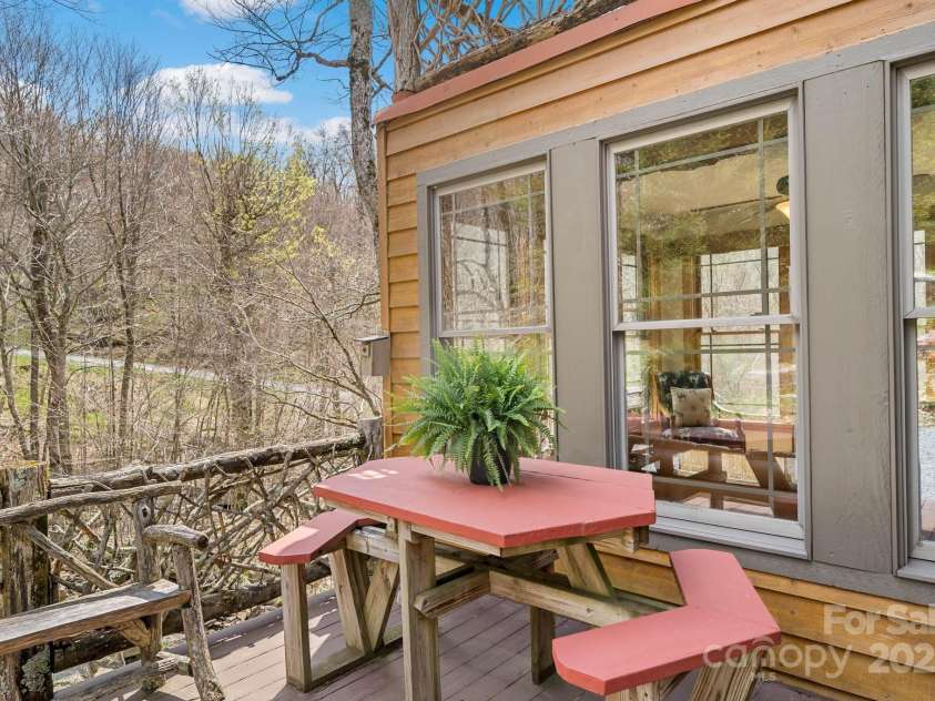 140 Spruce Hollow Road, Beech Mountain, NC 28604.  MLS# CAR4263469, YatesRealty ID 724. Back Patio off of Dining room 