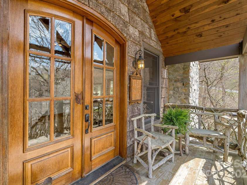 140 Spruce Hollow Road, Beech Mountain, NC 28604.  MLS# CAR4263469, YatesRealty ID 724. Mahogany Doors