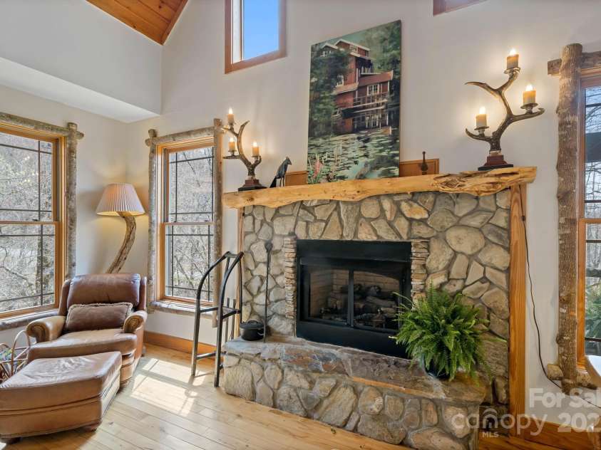140 Spruce Hollow Road, Beech Mountain, NC 28604.  MLS# CAR4263469, YatesRealty ID 724. Propane Fireplace