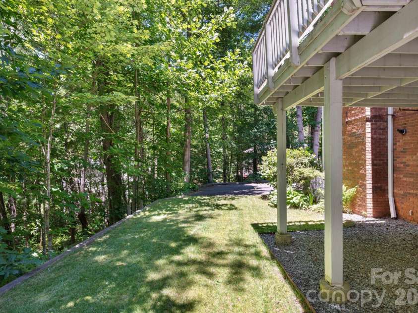 107 Ballantree Drive, Asheville, NC 28803.  MLS# CAR4351990, YatesRealty ID 7240. Level Terraced Back Yard