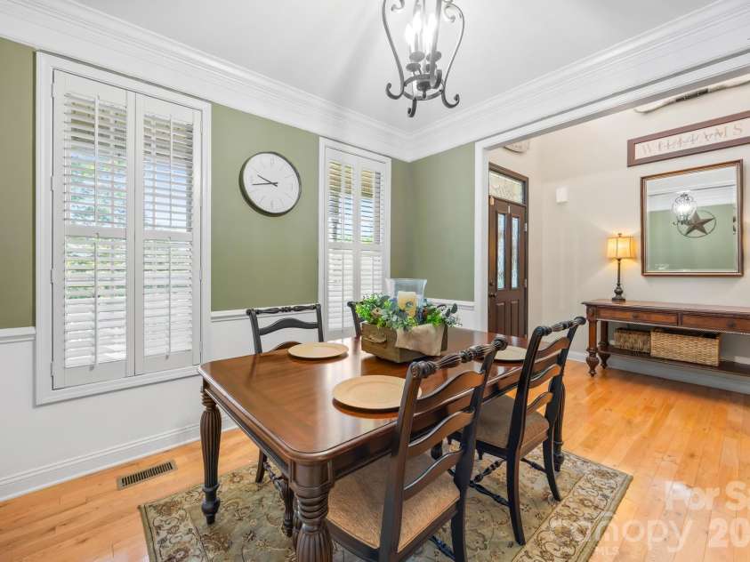 244 Mark Ryan Lane, Dallas, NC 28034.  MLS# CAR4389974, YatesRealty ID 725. Dining room with crown modeling