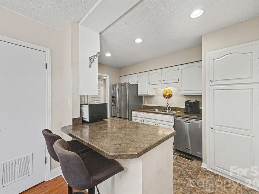 3030 Vernell Lane, Shelby, NC 28150.  MLS# CAR4344847, YatesRealty ID 7250. A large pantry with pull out shelves provides extra storage.