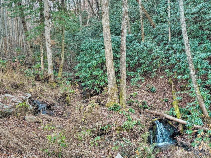 168 Laramie Heights, Andrews, NC 28901.  MLS# CAR4323146, YatesRealty ID 7254. Waterfall below house