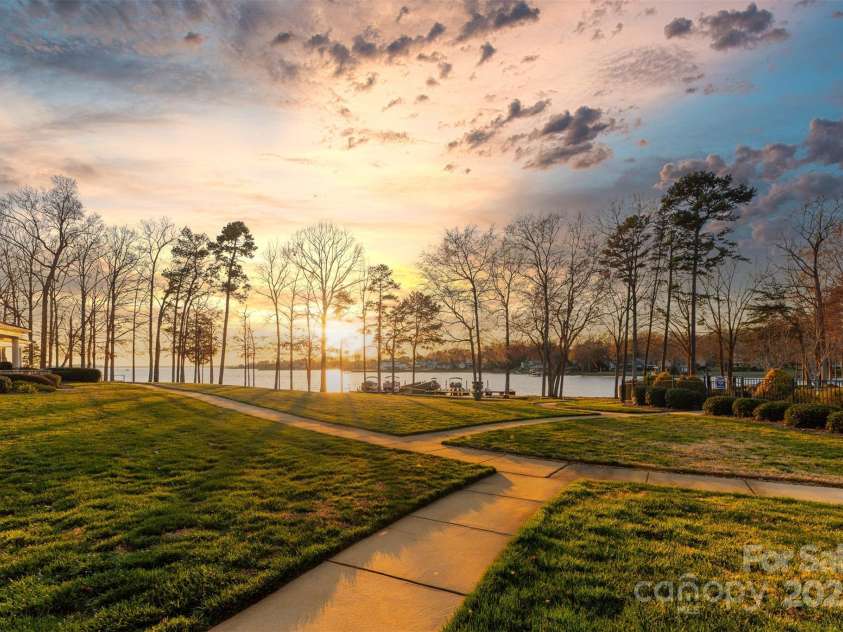 101 Cove Key Lane, Mooresville, NC 28117.  MLS# CAR4233761, YatesRealty ID 7255. Lots of Lush Landscape
