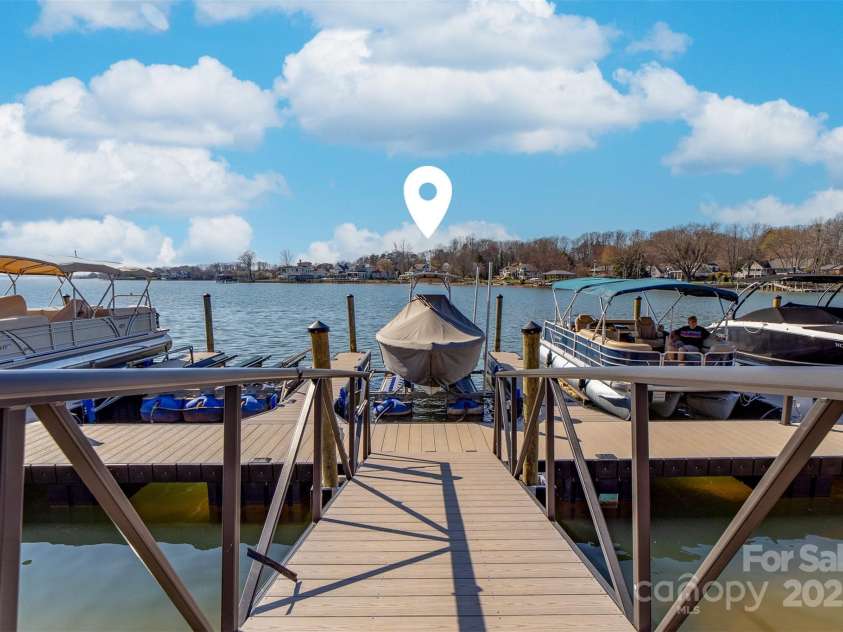 101 Cove Key Lane, Mooresville, NC 28117.  MLS# CAR4233761, YatesRealty ID 7255. Mako Boat, Lift, and Slip. Only 7 Slips in Cove Key