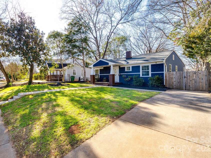 119 Smallwood Place, Charlotte, NC 28216.  MLS# CAR4221901, YatesRealty ID 7260. Long Driveway for ample parking