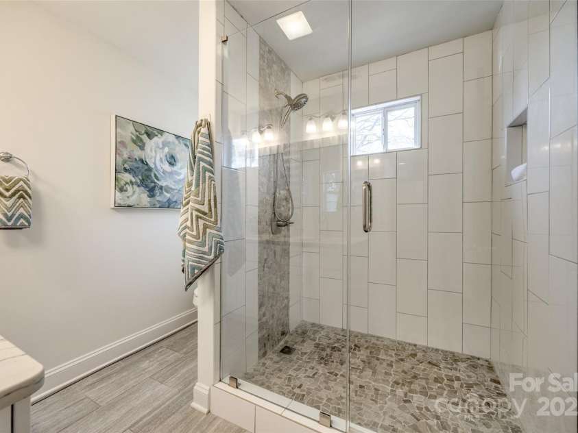 119 Smallwood Place, Charlotte, NC 28216.  MLS# CAR4221901, YatesRealty ID 7260. Primary Bathroom with floor to ceiling tile