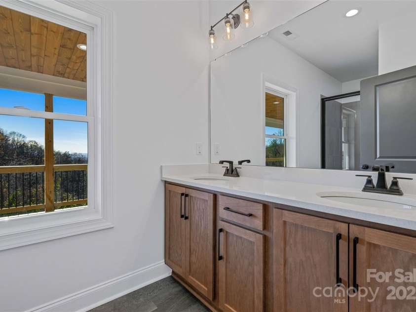 53 McKinley Drive, Hendersonville, NC 28792.  MLS# CAR4197454, YatesRealty ID 7263. Primary bathroom on main floor.