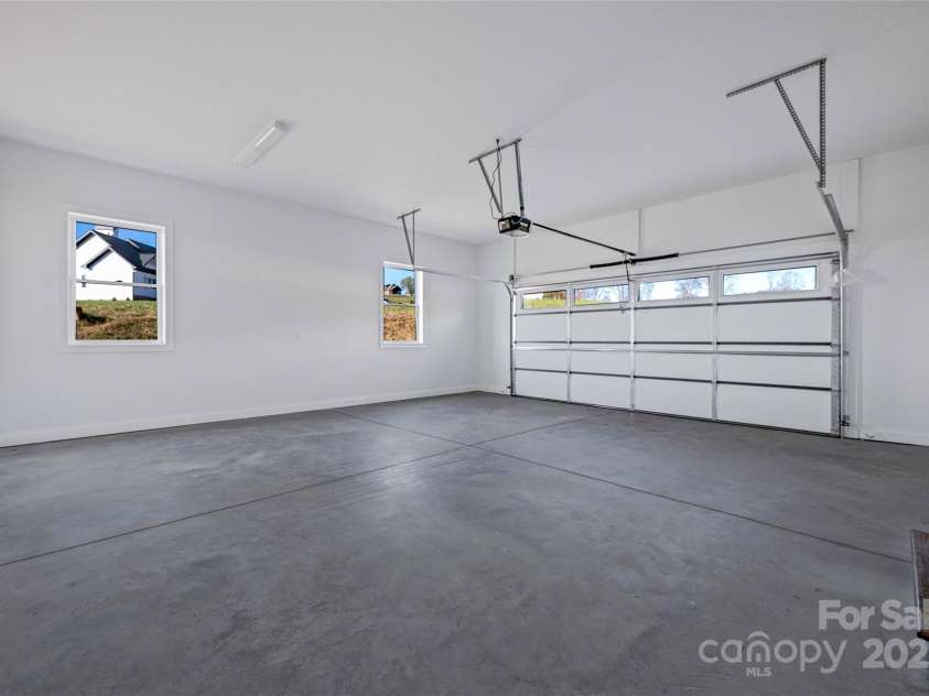 53 McKinley Drive, Hendersonville, NC 28792.  MLS# CAR4197454, YatesRealty ID 7263. Spacious 2 car garage on the main level