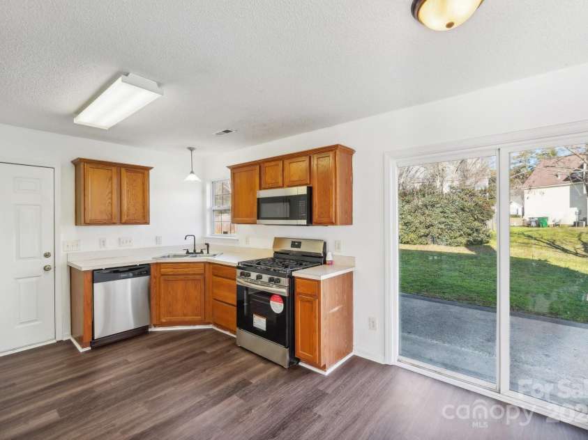 8827 Treyburn Drive, Charlotte, NC 28216.  MLS# CAR4203734, YatesRealty ID 7264. 