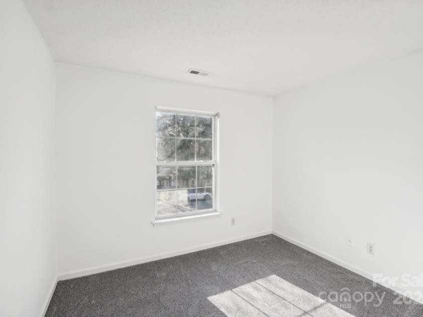 8827 Treyburn Drive, Charlotte, NC 28216.  MLS# CAR4203734, YatesRealty ID 7264. 