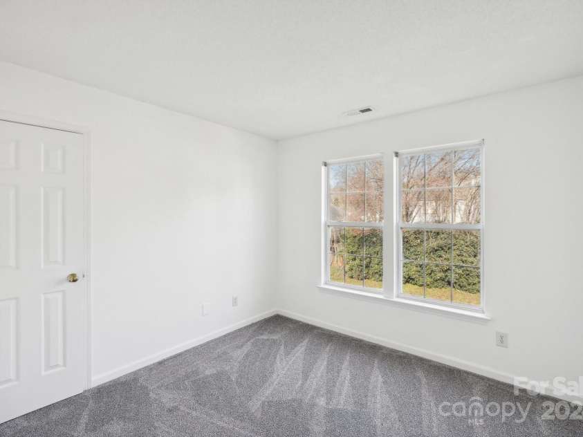 8827 Treyburn Drive, Charlotte, NC 28216.  MLS# CAR4203734, YatesRealty ID 7264. 