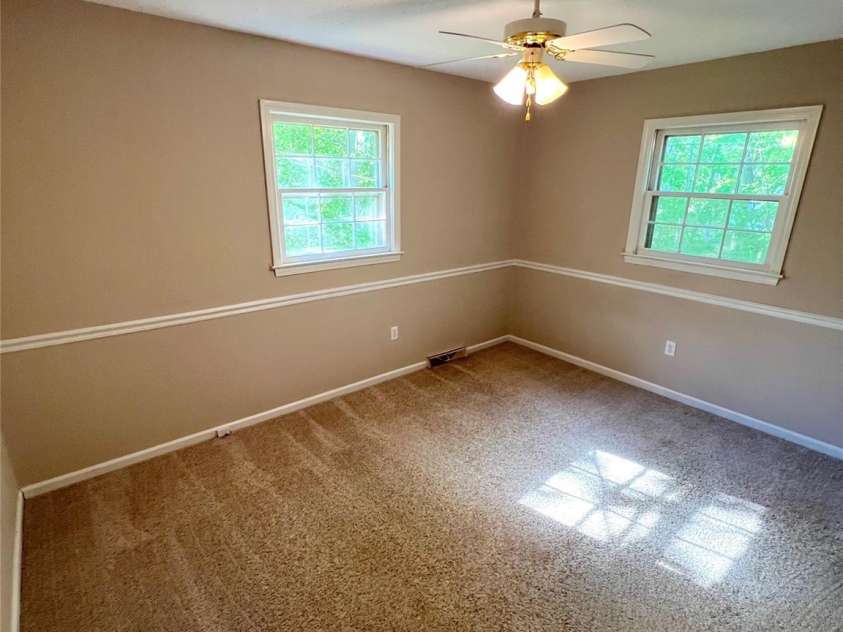 1111 Skyland Drive, Mount Pleasant, NC 28124.  MLS# CAR4155800, YatesRealty ID 7265. Bedroom #2 with freshly cleaned carpet and natural morning sunshine.