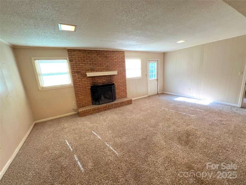 1111 Skyland Drive, Mount Pleasant, NC 28124.  MLS# CAR4155800, YatesRealty ID 7265. Spacious basement with bath that has endless design options.