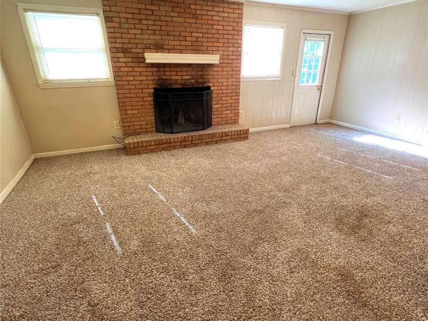 1111 Skyland Drive, Mount Pleasant, NC 28124.  MLS# CAR4155800, YatesRealty ID 7265. Wood-burning fireplace in basement.