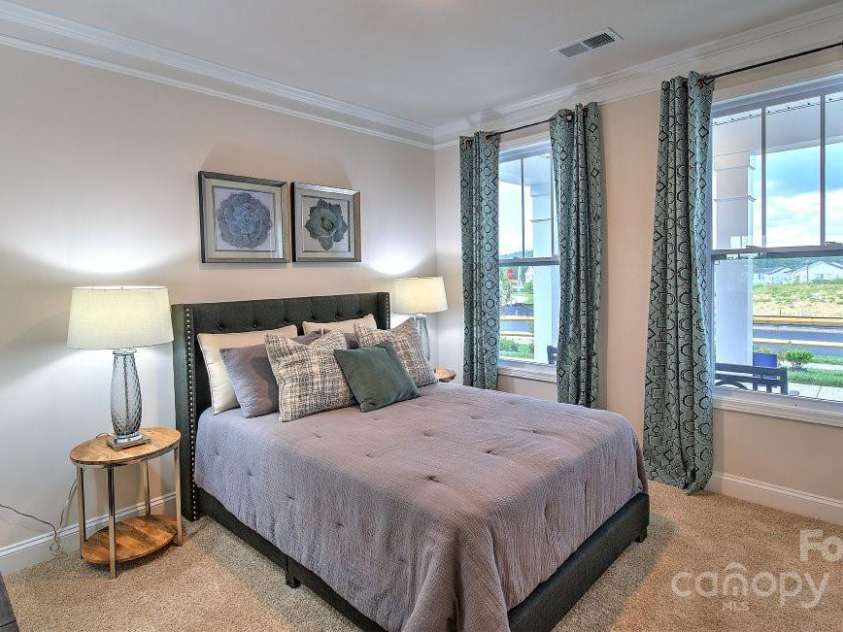 571 Fox Cove Road, Hendersonville, NC 28792.  MLS# CAR4199127, YatesRealty ID 7266. Guest BR at the front of the home.