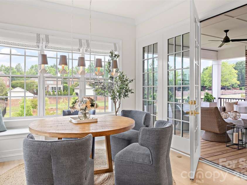 3011 Ella Katherine Way, Charlotte, NC 28210.  MLS# CAR4381192, YatesRealty ID 7267. The dining area opens to the main floor balcony