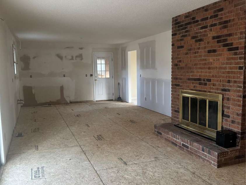 29 Westfield Road, Fletcher, NC 28732.  MLS# CAR4234206, YatesRealty ID 7268. Den area looking into Kitchen