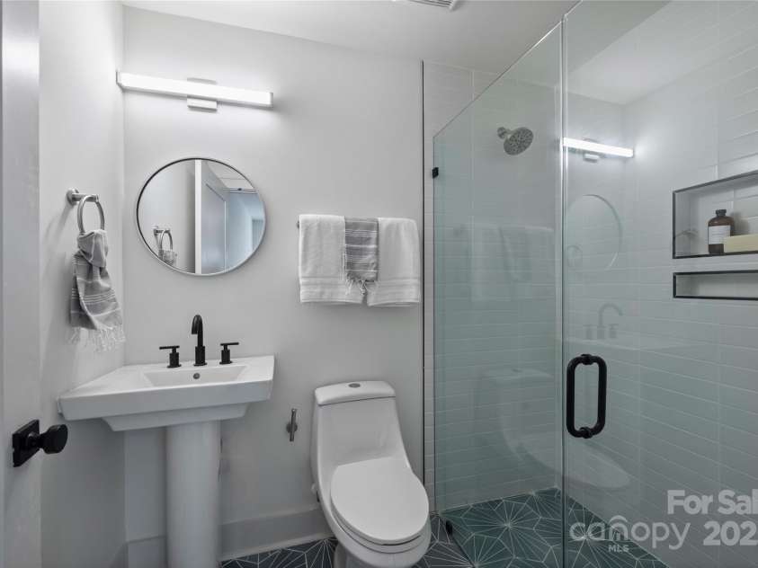 2023 Thurmond Place, Charlotte, NC 28205.  MLS# CAR4206034, YatesRealty ID 7271. Connected bath. Representative from last completed unit.