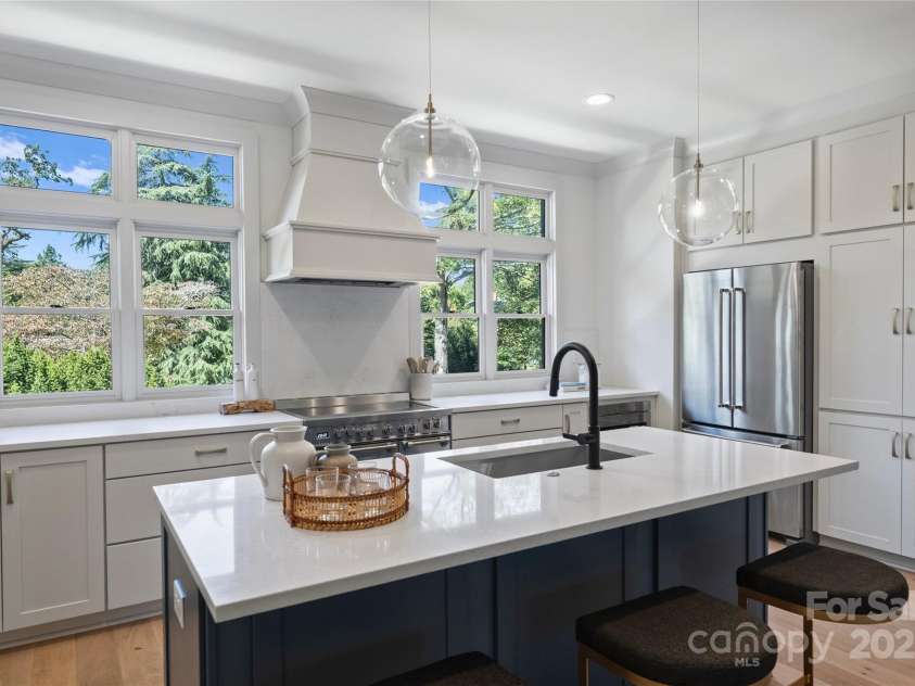 2023 Thurmond Place, Charlotte, NC 28205.  MLS# CAR4206034, YatesRealty ID 7271. Kitchen. Representative from last completed unit.