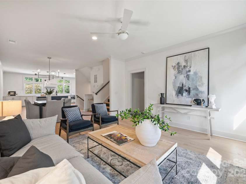 2023 Thurmond Place, Charlotte, NC 28205.  MLS# CAR4206034, YatesRealty ID 7271. Living Room. Representative from last completed unit.