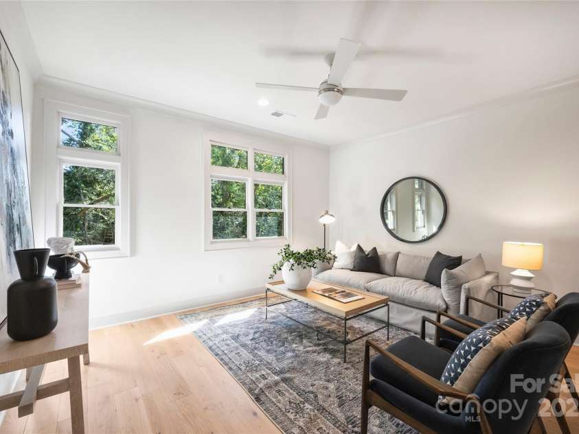 2023 Thurmond Place, Charlotte, NC 28205.  MLS# CAR4206034, YatesRealty ID 7271. Living Room Representative from last completed unit.