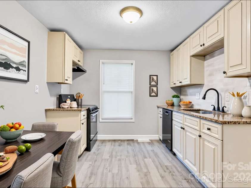 4229 Plato Circle, Charlotte, NC 28208.  MLS# CAR4303896, YatesRealty ID 7273. Full shot of kitchen (virtually staged).