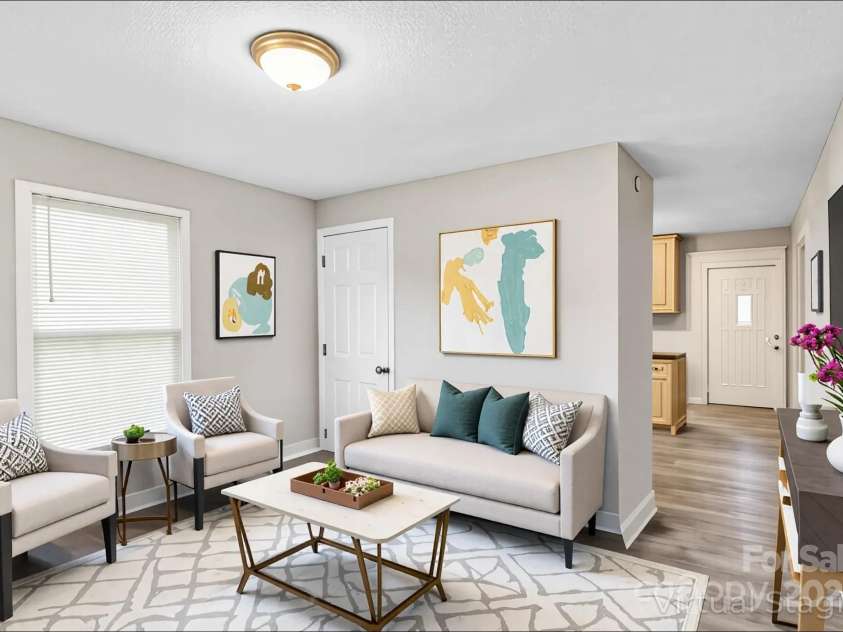 4229 Plato Circle, Charlotte, NC 28208.  MLS# CAR4303896, YatesRealty ID 7273. Living room, immediately walking in (virtually staged).