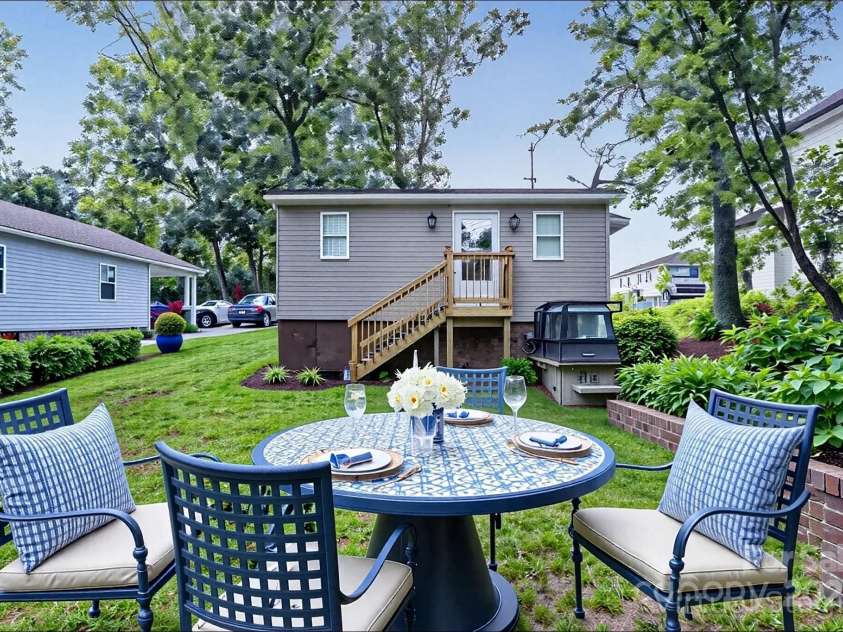 4229 Plato Circle, Charlotte, NC 28208.  MLS# CAR4303896, YatesRealty ID 7273. Rear of home; distanced shot (virtually staged).
