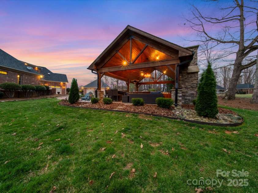 810 Lake Wright Road, China Grove, NC 28023.  MLS# CAR4236007, YatesRealty ID 7274. Pavilion complete with outdoor kitchen next to pool