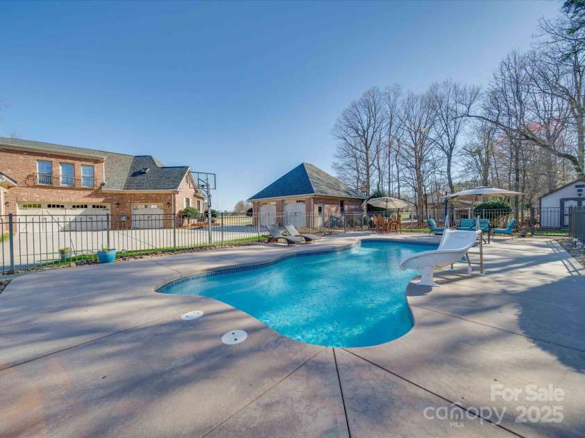 810 Lake Wright Road, China Grove, NC 28023.  MLS# CAR4236007, YatesRealty ID 7274. Saltwater Pool